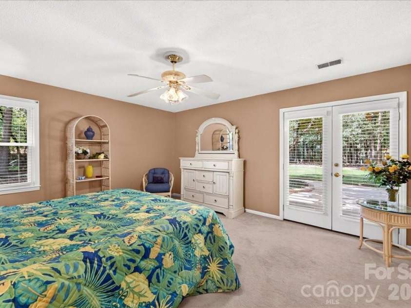 3825 Hoodridge Lane, Charlotte, NC 28227.  MLS# CAR4411305, YatesRealty ID 43802. Master bedroom