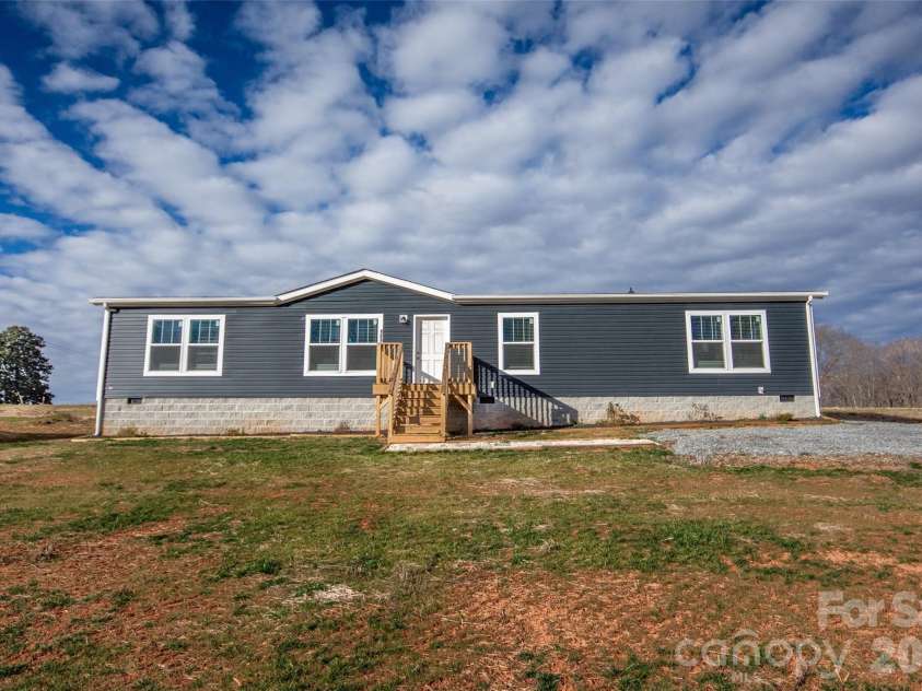 489 Eagle Mills Road, Hamptonville, NC 27020.  MLS# CAR4337750, YatesRealty ID 4381. 