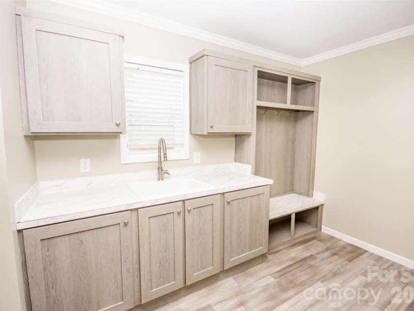 489 Eagle Mills Road, Hamptonville, NC 27020.  MLS# CAR4337750, YatesRealty ID 4381. Mud Room/Laundry Room!