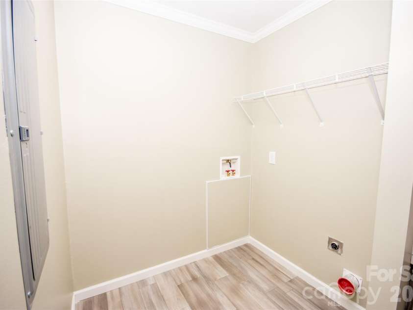 489 Eagle Mills Road, Hamptonville, NC 27020.  MLS# CAR4337750, YatesRealty ID 4381. Washer/Dryer Hookup area in Large Mud Room