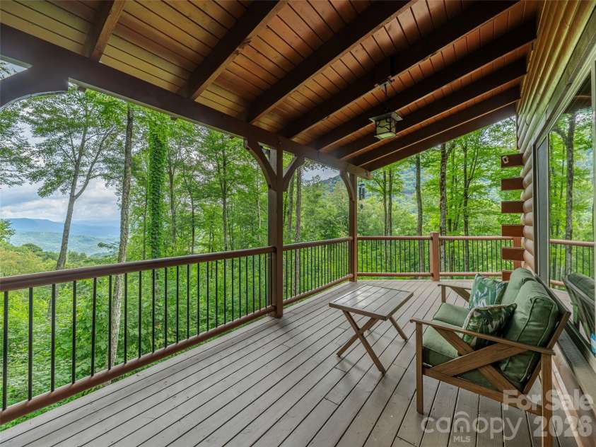 332 Gadohi Trail, Maggie Valley, NC 28751.  MLS# CAR4414080, YatesRealty ID 43811. Covered view-facing deck