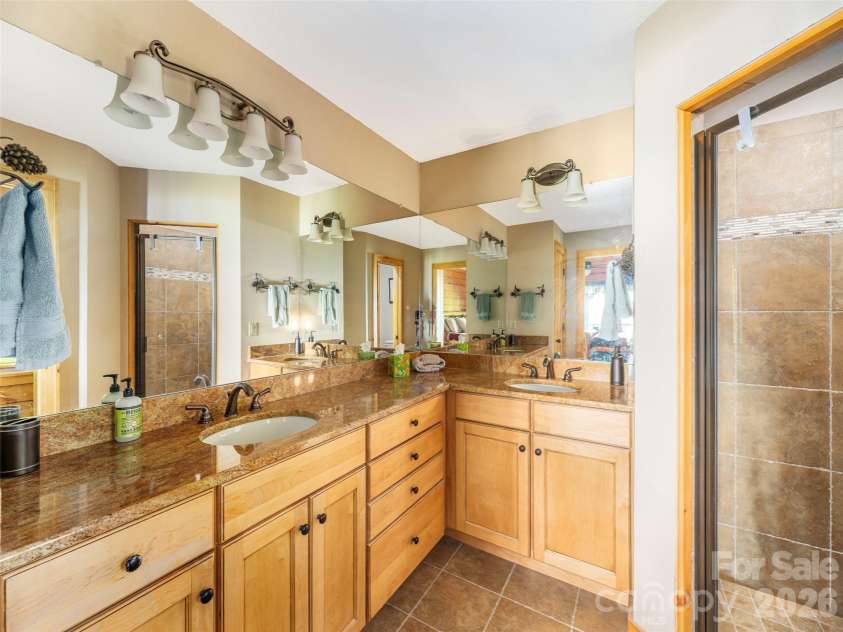 332 Gadohi Trail, Maggie Valley, NC 28751.  MLS# CAR4414080, YatesRealty ID 43811. Primary bathroom