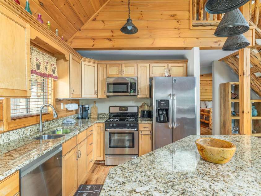 332 Gadohi Trail, Maggie Valley, NC 28751.  MLS# CAR4414080, YatesRealty ID 43811. Well-appointed kitchen