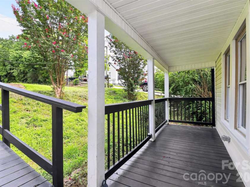 58 Skipwith Street, Concord, NC 28025.  MLS# CAR4413549, YatesRealty ID 43818. Cozy Front Porch