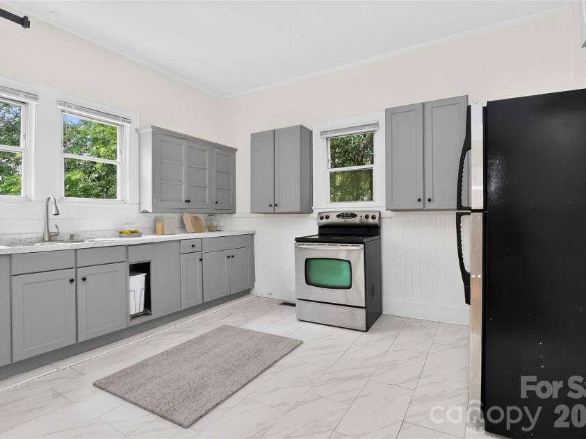 58 Skipwith Street, Concord, NC 28025.  MLS# CAR4413549, YatesRealty ID 43818. Kitchen (virtually staged)