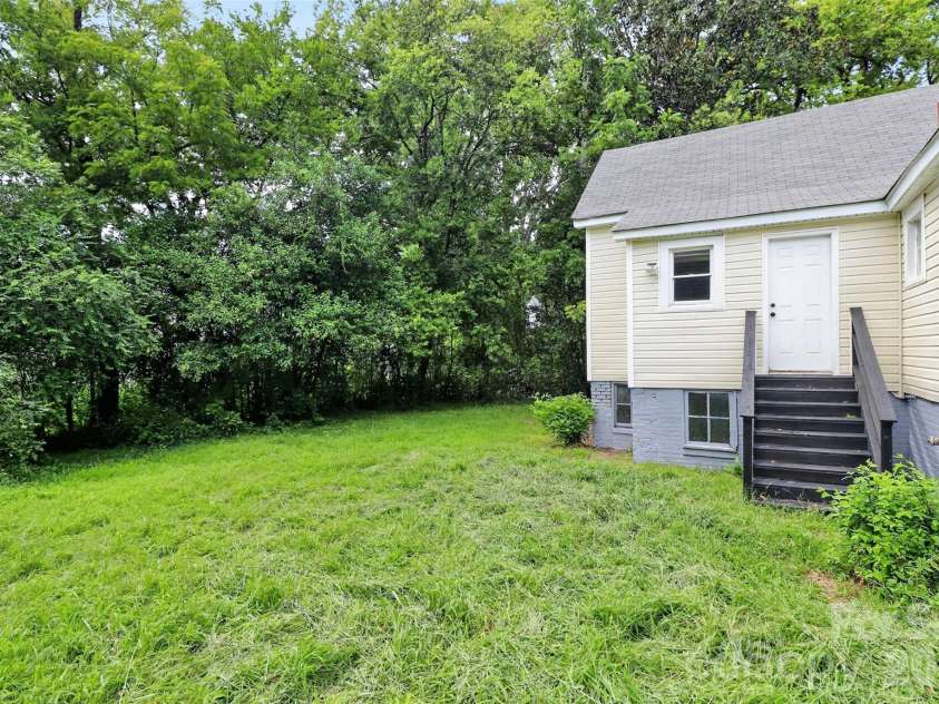 58 Skipwith Street, Concord, NC 28025.  MLS# CAR4413549, YatesRealty ID 43818. Spacious Backyard
