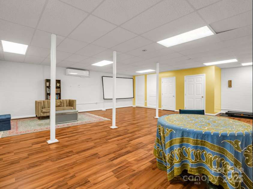 288 Long Ridge Road, Old Fort, NC 28762.  MLS# CAR4297306, YatesRealty ID 4382. Massive recreation room (downstairs)