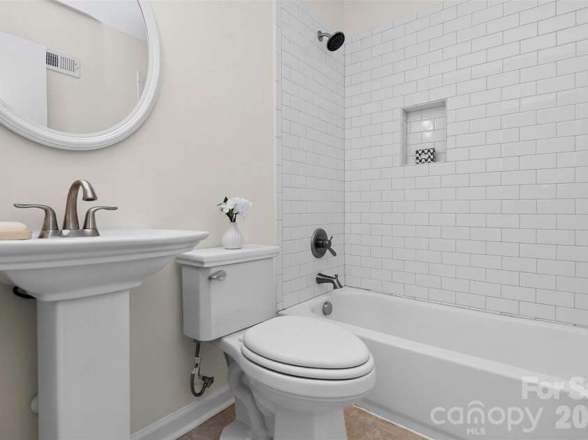 4726 Walden Court, Charlotte, NC 28210.  MLS# CAR4408855, YatesRealty ID 43826. Hall full bath with tile shower tub combo