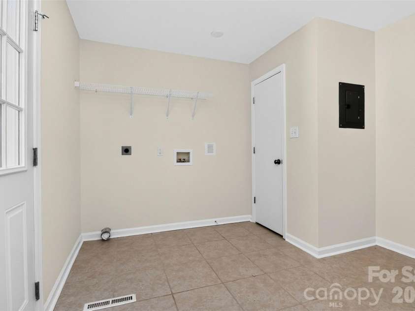 4726 Walden Court, Charlotte, NC 28210.  MLS# CAR4408855, YatesRealty ID 43826. Large Laundry utility room.
