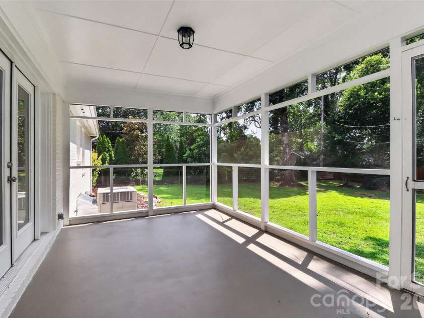 4726 Walden Court, Charlotte, NC 28210.  MLS# CAR4408855, YatesRealty ID 43826. Peaceful screen porch