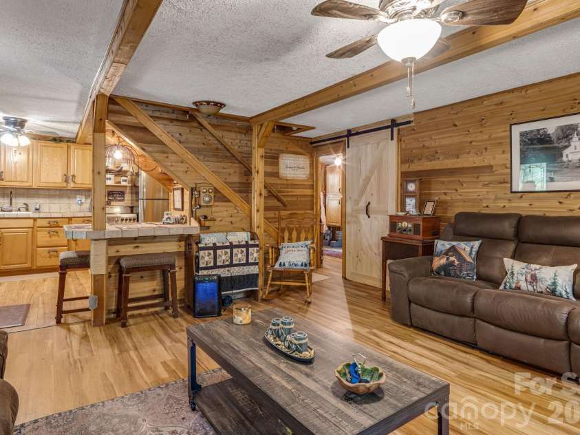 242 Whitney Boulevard, Lake Lure, NC 28746.  MLS# CAR4414218, YatesRealty ID 43829. 