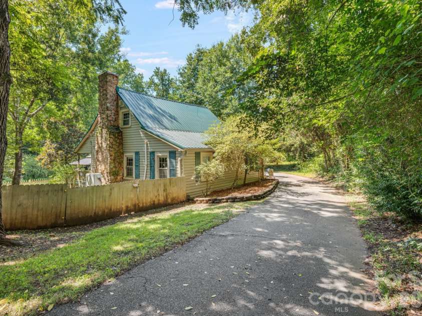 242 Whitney Boulevard, Lake Lure, NC 28746.  MLS# CAR4414218, YatesRealty ID 43829. 