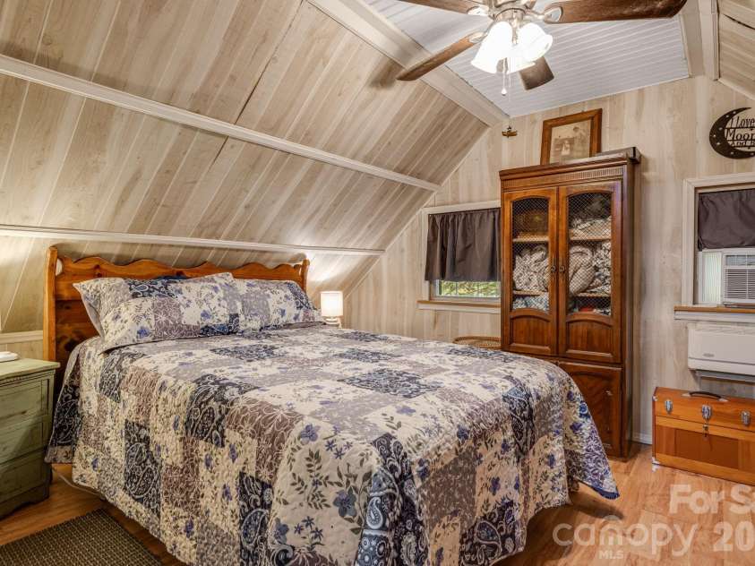 242 Whitney Boulevard, Lake Lure, NC 28746.  MLS# CAR4414218, YatesRealty ID 43829. 