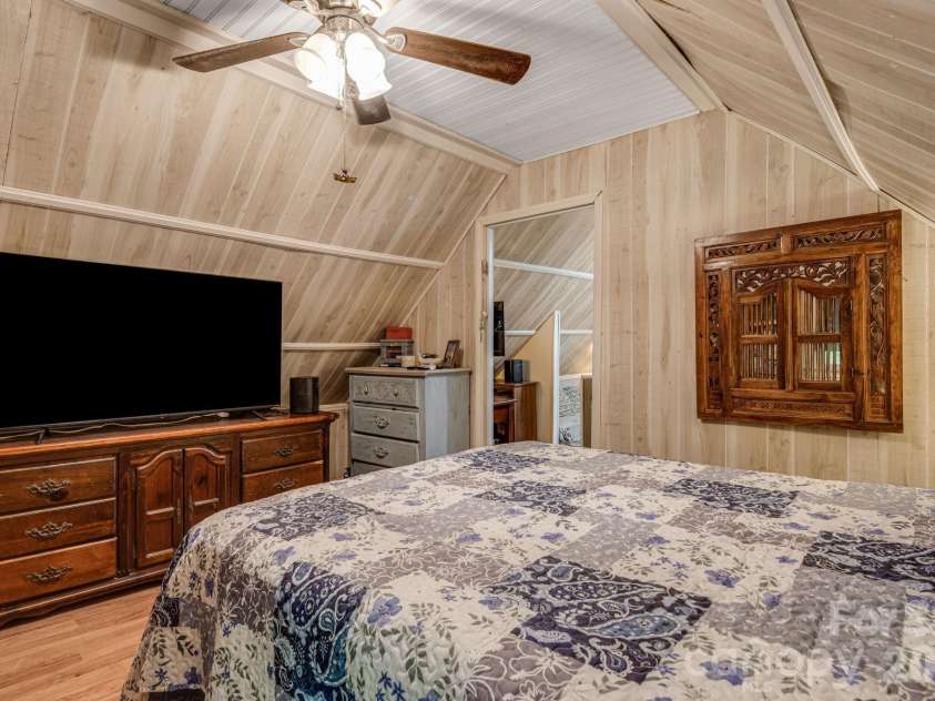 242 Whitney Boulevard, Lake Lure, NC 28746.  MLS# CAR4414218, YatesRealty ID 43829. 