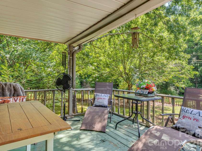 242 Whitney Boulevard, Lake Lure, NC 28746.  MLS# CAR4414218, YatesRealty ID 43829. 