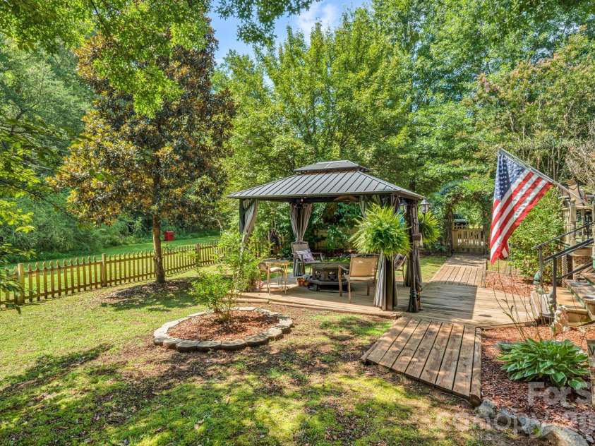 242 Whitney Boulevard, Lake Lure, NC 28746.  MLS# CAR4414218, YatesRealty ID 43829. 