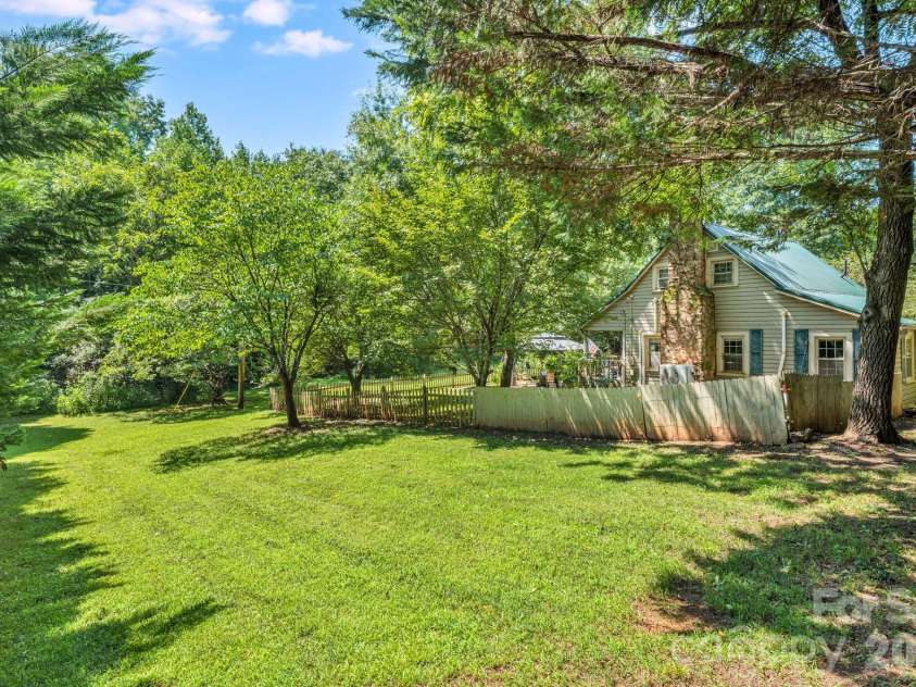 242 Whitney Boulevard, Lake Lure, NC 28746.  MLS# CAR4414218, YatesRealty ID 43829. 