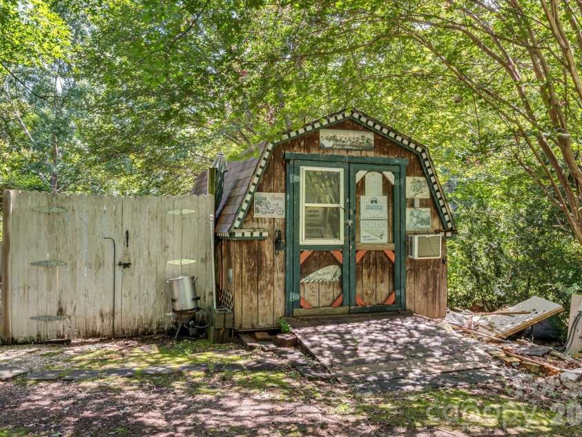 242 Whitney Boulevard, Lake Lure, NC 28746.  MLS# CAR4414218, YatesRealty ID 43829. 
