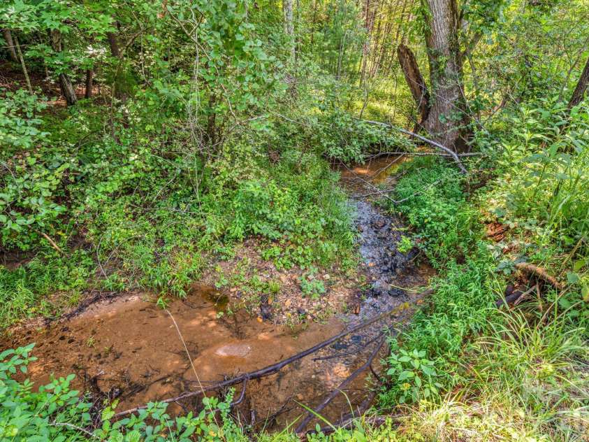 242 Whitney Boulevard, Lake Lure, NC 28746.  MLS# CAR4414218, YatesRealty ID 43829. 