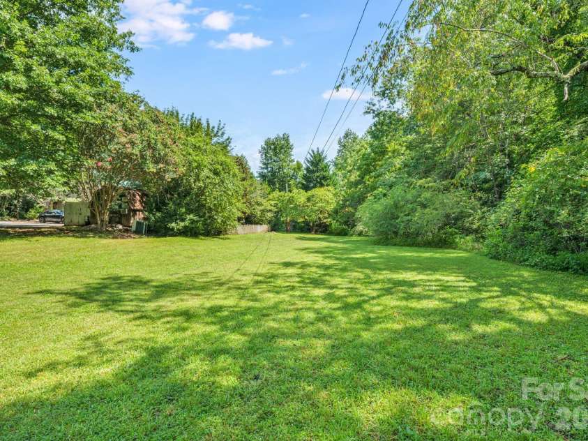 242 Whitney Boulevard, Lake Lure, NC 28746.  MLS# CAR4414218, YatesRealty ID 43829. 