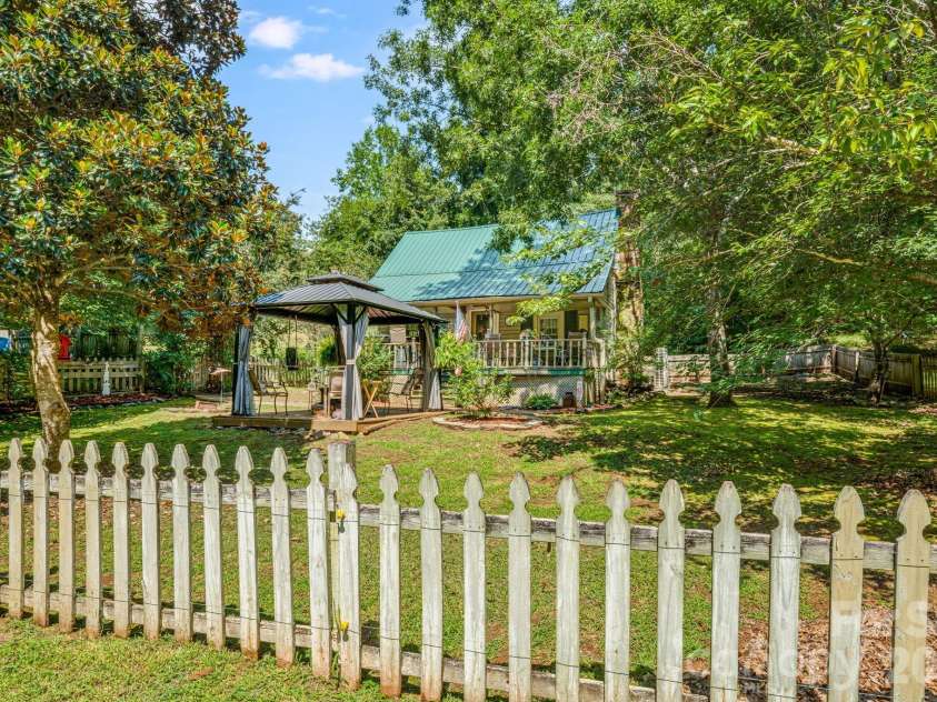 242 Whitney Boulevard, Lake Lure, NC 28746.  MLS# CAR4414218, YatesRealty ID 43829. 