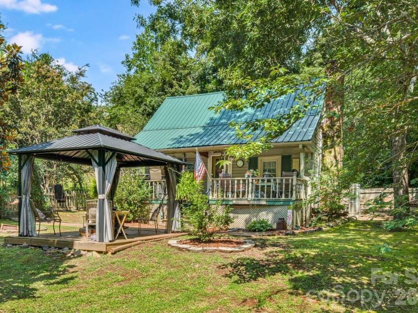 242 Whitney Boulevard, Lake Lure, NC 28746.  MLS# CAR4414218, YatesRealty ID 43829. 