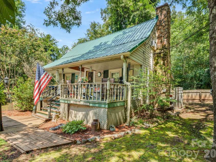 242 Whitney Boulevard, Lake Lure, NC 28746.  MLS# CAR4414218, YatesRealty ID 43829. 