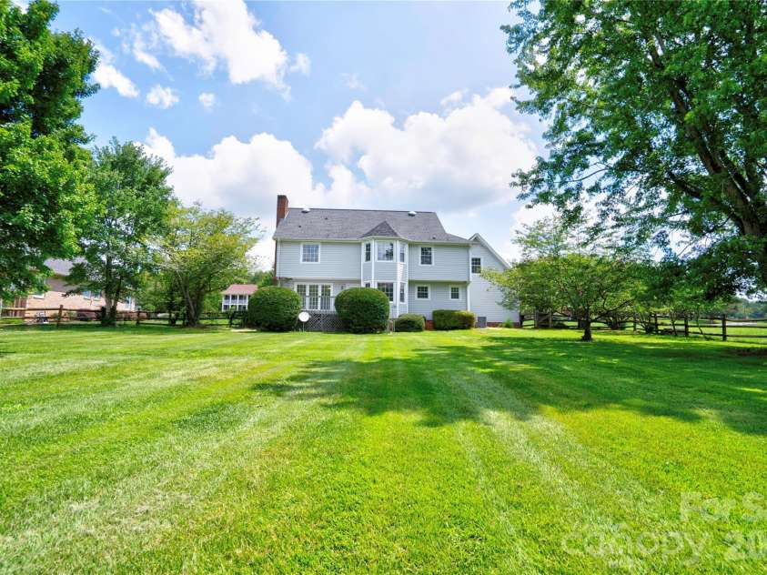 144 Oak Point Drive, Cherryville, NC 28021.  MLS# CAR4412077, YatesRealty ID 43836. Back