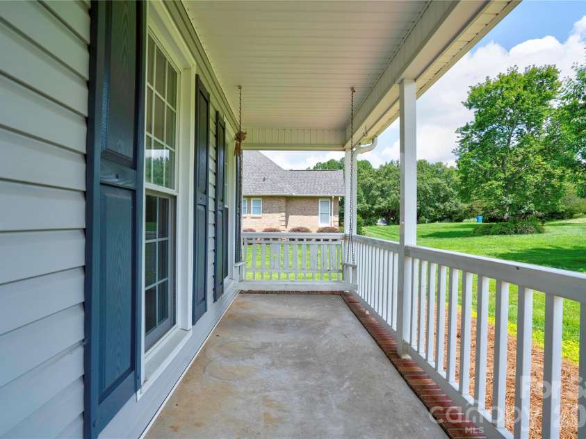 144 Oak Point Drive, Cherryville, NC 28021.  MLS# CAR4412077, YatesRealty ID 43836. Covered Front Porch