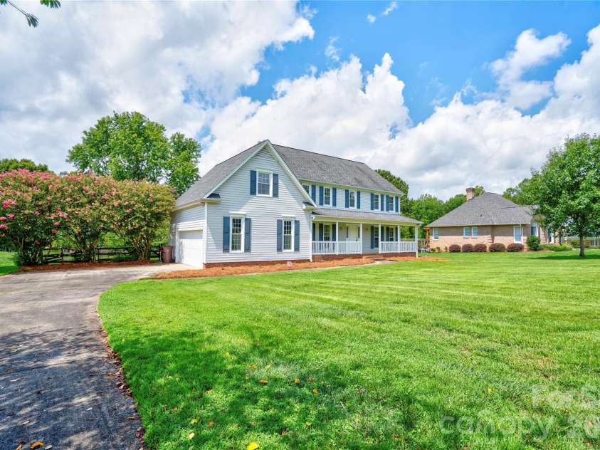 144 Oak Point Drive, Cherryville, NC 28021.  MLS# CAR4412077, YatesRealty ID 43836. Front Left