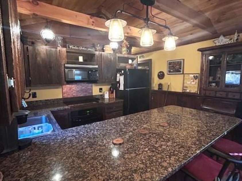 116 Minerva Lane, Sapphire, NC 28774.  MLS# CAR4237813, YatesRealty ID 4384. 
