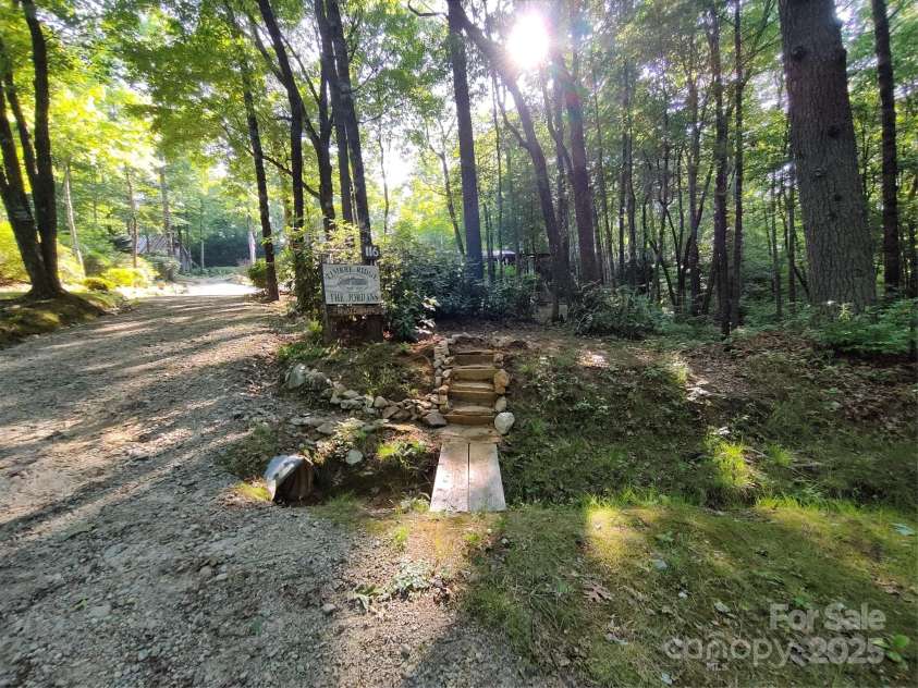 116 Minerva Lane, Sapphire, NC 28774.  MLS# CAR4237813, YatesRealty ID 4384. 