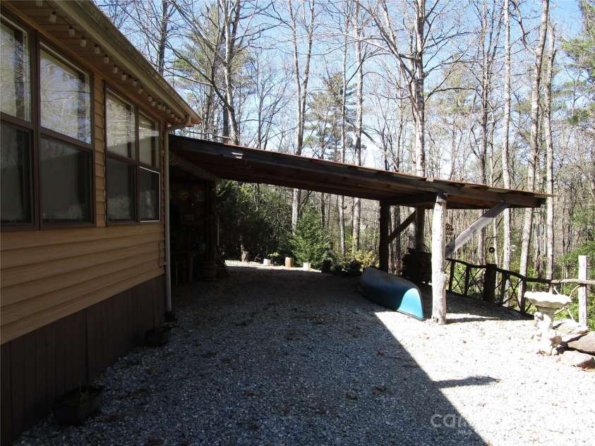 116 Minerva Lane, Sapphire, NC 28774.  MLS# CAR4237813, YatesRealty ID 4384. Carport