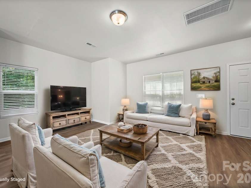 6013 Vista Woods Lane, Charlotte, NC 28215.  MLS# CAR4413340, YatesRealty ID 43842. Great Room - Virtually Staged
