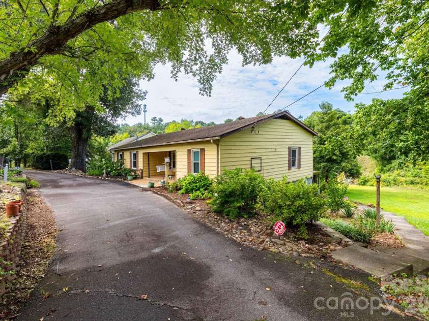 55 Banks Town Road, Weaverville, NC 28787.  MLS# CAR4395465, YatesRealty ID 43845. Crescent-shaped driveway with two access points for convenient entry and exit.