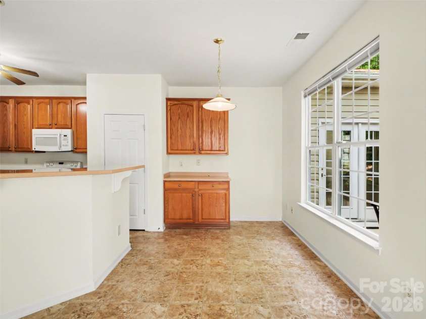834 Platinum Drive, Fort Mill, SC 29708.  MLS# CAR4382795, YatesRealty ID 43860. Breakfast Nook with built-in desk area