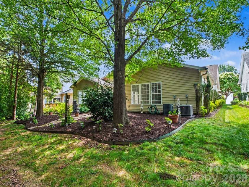 834 Platinum Drive, Fort Mill, SC 29708.  MLS# CAR4382795, YatesRealty ID 43860. Landscaped Backyard