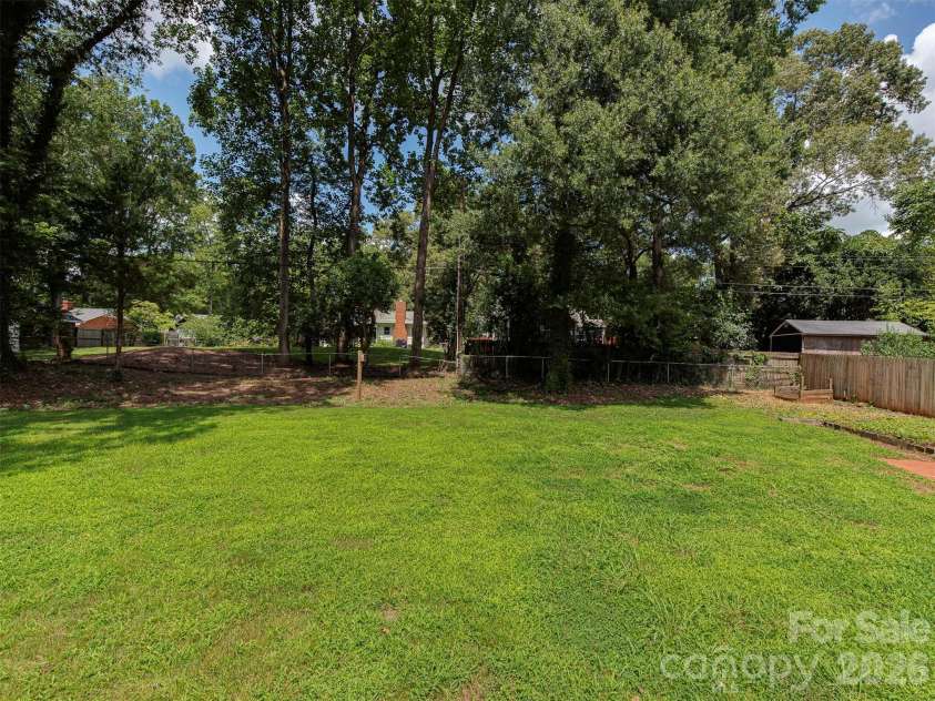 1323 Goodwin Avenue, Charlotte, NC 28205.  MLS# CAR4414214, YatesRealty ID 43861. Large flat yard for the Pooch!