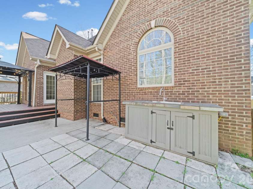 217 Edenshire Court, Indian Trail, NC 28079.  MLS# CAR4342987, YatesRealty ID 4387. Grilling Station/Patio