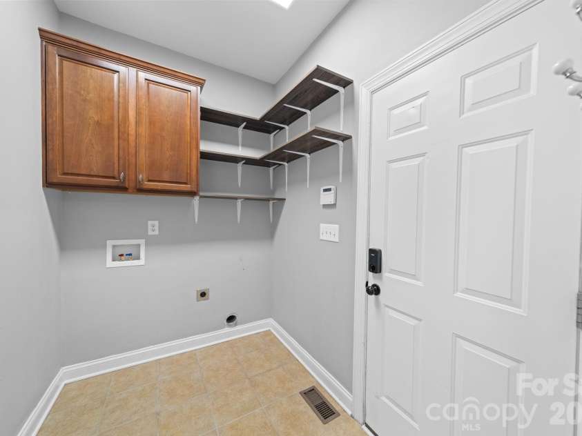 217 Edenshire Court, Indian Trail, NC 28079.  MLS# CAR4342987, YatesRealty ID 4387. Laundry
