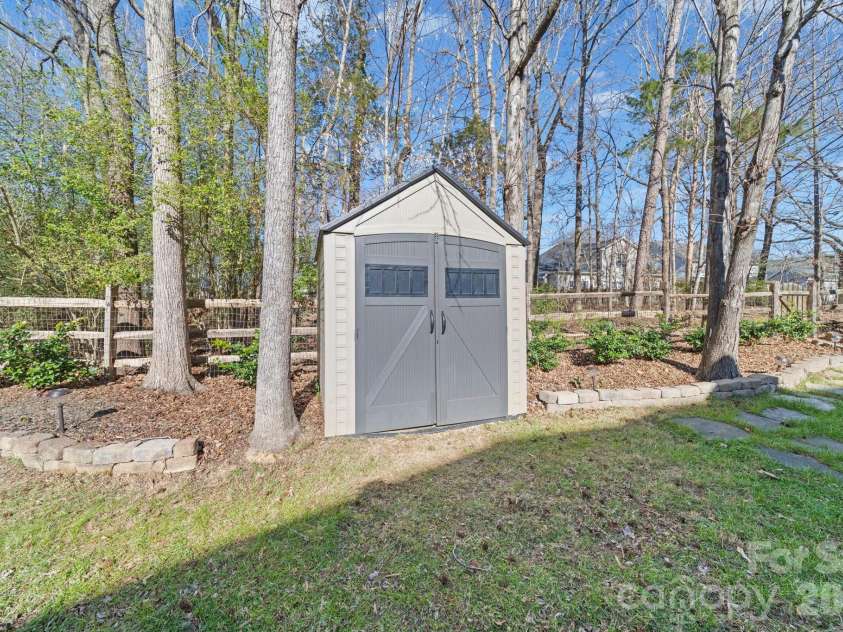 217 Edenshire Court, Indian Trail, NC 28079.  MLS# CAR4342987, YatesRealty ID 4387. Shed