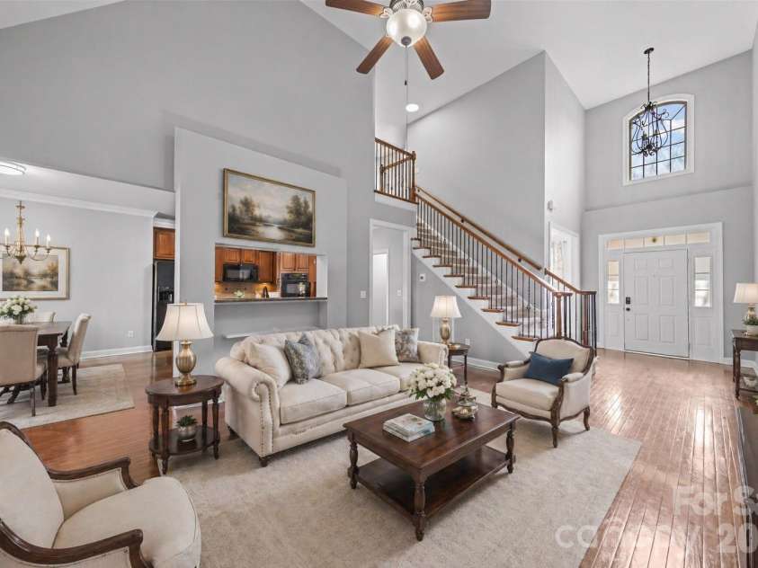 217 Edenshire Court, Indian Trail, NC 28079.  MLS# CAR4342987, YatesRealty ID 4387. Virtually Staged living room