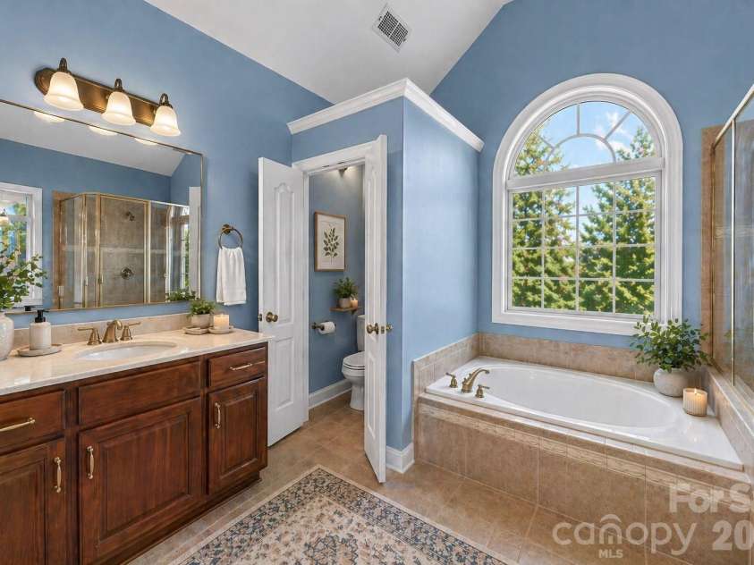 217 Edenshire Court, Indian Trail, NC 28079.  MLS# CAR4342987, YatesRealty ID 4387. Virtually Staged Primary Bath