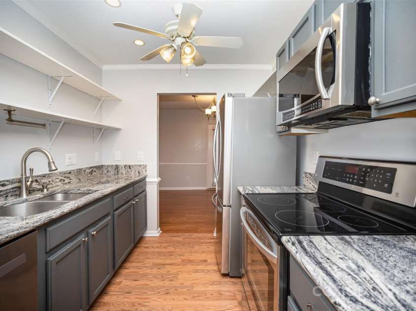 805 Sardis Cove Drive, Charlotte, NC 28270.  MLS# CAR4324694, YatesRealty ID 4388. Kitchen has SS appliances