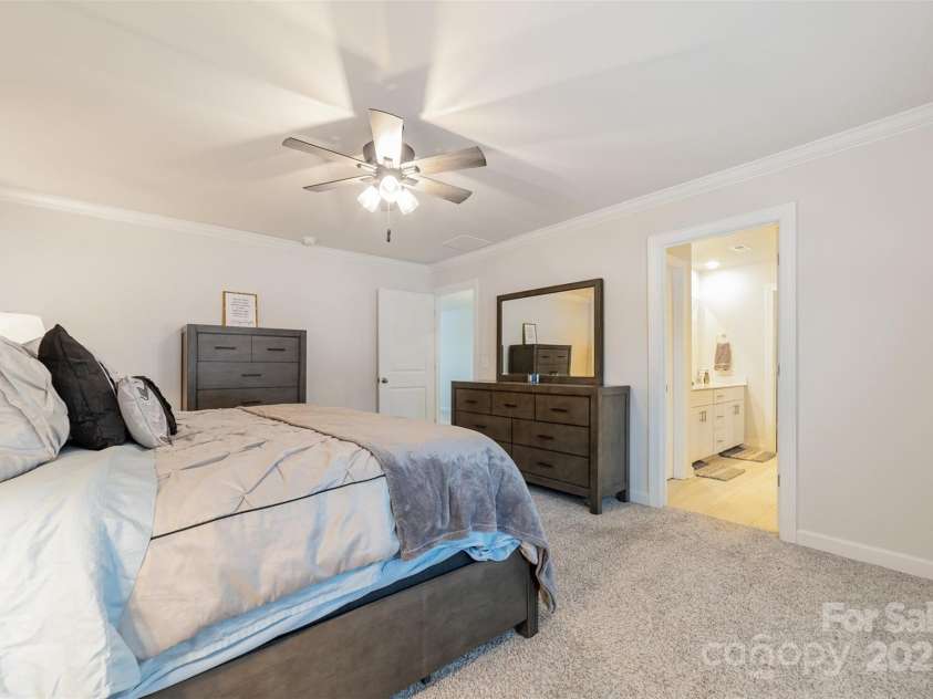 920 Clementine Road, Monroe, NC 28110.  MLS# CAR4225803, YatesRealty ID 4388. Primary Bedroom with view to the En-Suite Bath