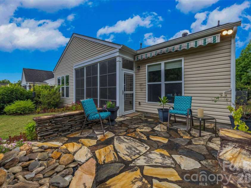 1044 Orchid Lane, Fort Mill, SC 29707.  MLS# CAR4396996, YatesRealty ID 43899. Private backyard entertaining area