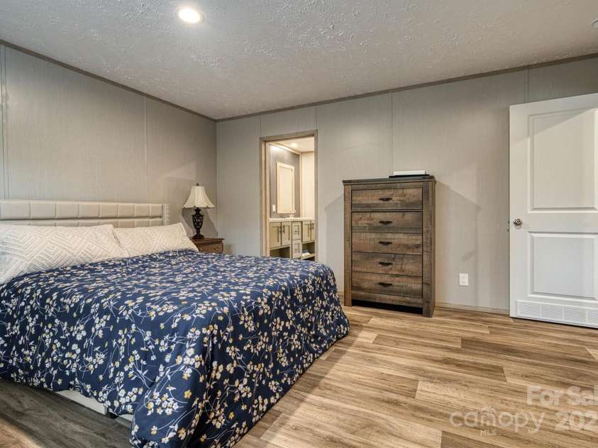 152 Patchwork Drive, Statesville, NC 28677.  MLS# CAR4300158, YatesRealty ID 4390. Primary Bedroom