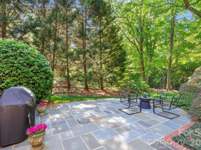 4026 Sharon View Road, Charlotte, NC 28226.  MLS# CAR4346910, YatesRealty ID 4390. The backyard patio.