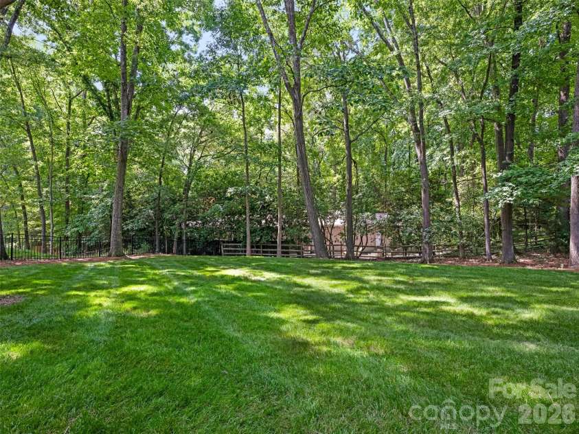 4026 Sharon View Road, Charlotte, NC 28226.  MLS# CAR4346910, YatesRealty ID 4390. The large lawn area is perfect for outdoor games