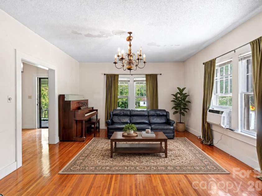 96 Huntsville Road, Marion, NC 28752.  MLS# CAR4413751, YatesRealty ID 43906. Virtually Staged Living Room